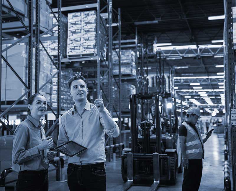 Worker in the warehouse checking the stock.